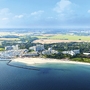 Luftaufnahme des Ostseeresorts Dampland mit Strand und Meer.