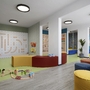 Spielzimmer mit bunten Möbeln und Wanddekorationen im Rabac Sunny Hotel & Residence.
