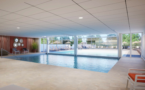 Innenpool mit Blick auf Außenbereich im Odalys Résidence Prestige L'Oree du Parc.