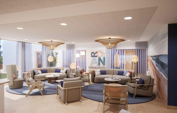 Moderne Lobby mit Sitzbereich und dekorativen Elementen der Résidence Odalys.