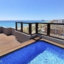 Dachterrasse mit Pool und Blick auf Strand und Meer in Peñíscola.